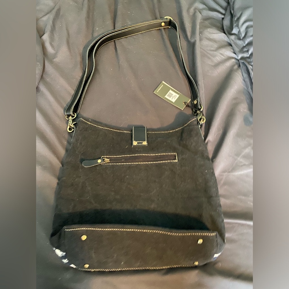 Myra bag never used. Black and white